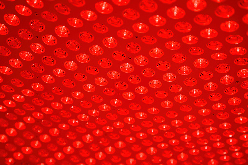 Red light therapy bed closeup to the panel of red and near infrared light