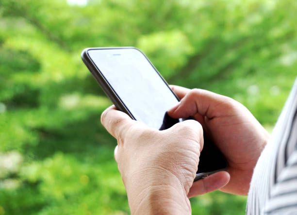 istock holding on smart phone 1577856860