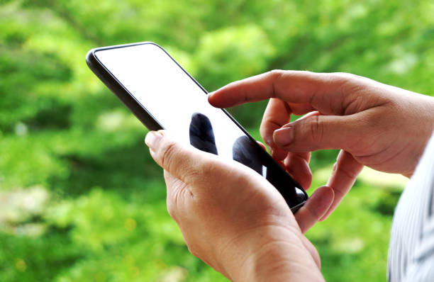 istock holding on smart phone 1577857379