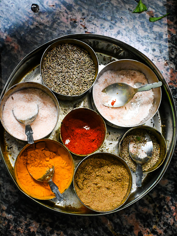 Cooking spices powder ingredients in an Indian kichen.