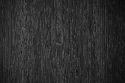Black and white vertical wood texture background. Dark vertical lines wooden textured background.