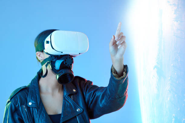 istock Woman, point and virtual reality glasses in studio with holographic explosion, game or tech in metaverse. Girl, futuristic ar goggles and gas mask in digital transformation, vision or user experience 1577933002