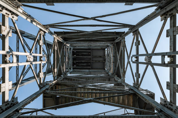 istock Bottom view of an abandoned mine shaft tower 1577947659