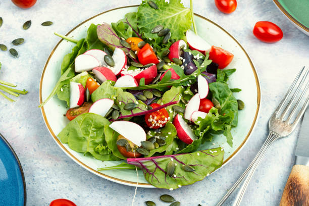 istock Fresh salad with vegetables, vegan recipe. 1577955485