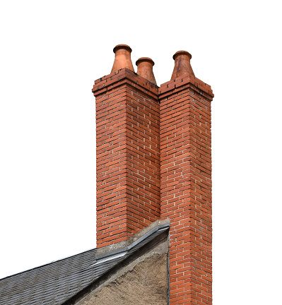 Tall brick chimneys isolated on the white background