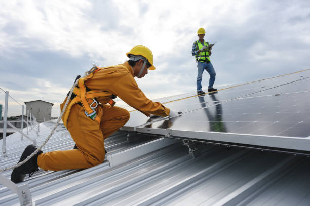 istock Technician Inspector Quality in Solar Roof Panel Installation with Installer, Quality Control Re-Check in Work of Sustainable Photovoltaic Installation on Factory Roof Buildings. 1577998404