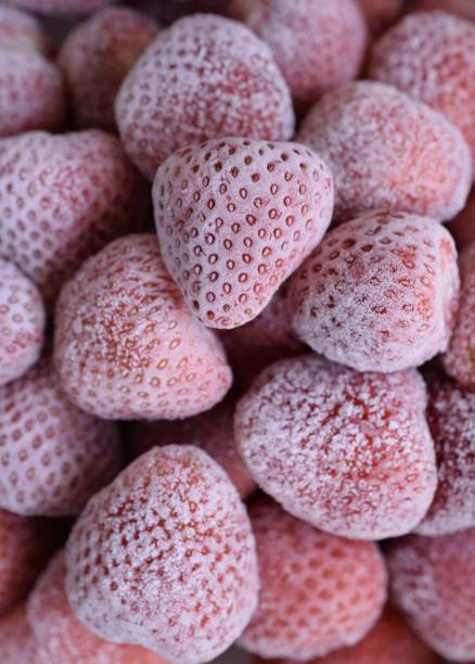 istock lots of frozen strawberries. 1578026738
