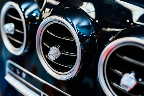 istock Air conditioners on car dashboard regulate of heat and cold 1578037945