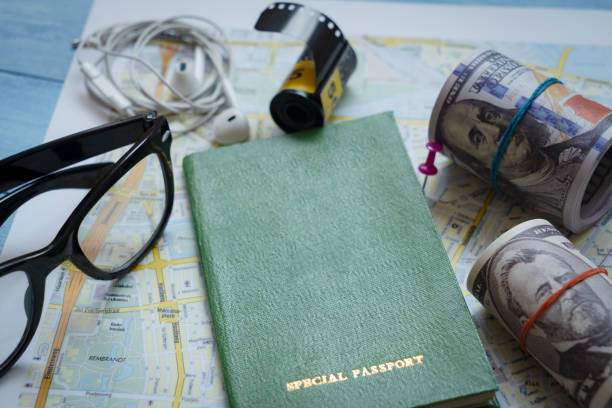 Passport and money on map. travel concepts