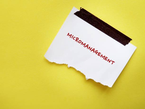 istock Torn note stick on yellow copy space background with text written MICROMANAGEMENT refer to management style which boss or manager gives excessive supervision to employees, control every part of project 1578055206