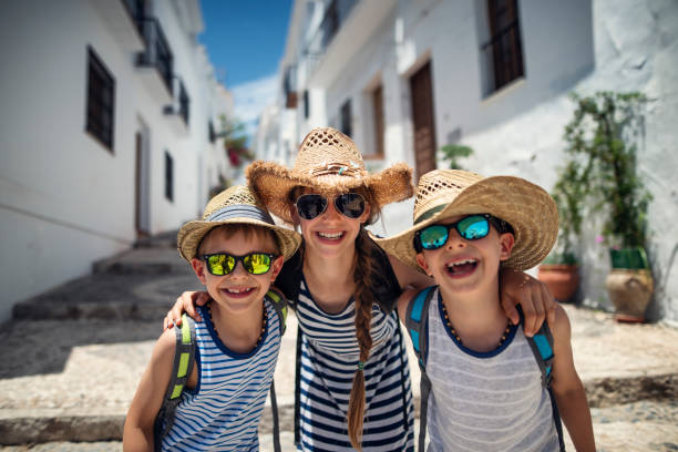 istock Kids sightseeing a town in Andalusia, Spain 1578084044