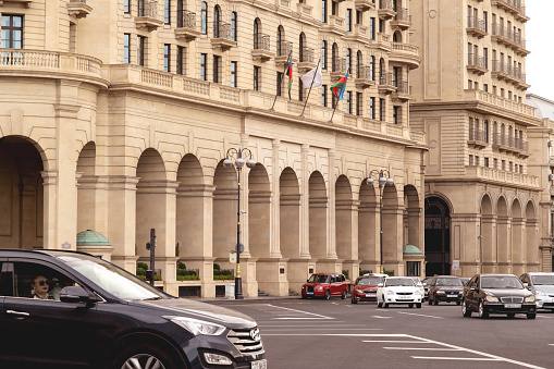 Baku, Azerbaijan - June 28, 2023: A snapshot capturing the grandeur of Four Seasons Hotel bathed in the morning sunlight.