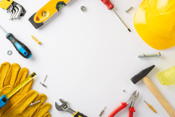istock Labor Day celebration with construction professionals: top-view shot, featuring helmet, gloves, and building instruments on white isolated background. Ideal for Labor Day content, promotions, or ads 1578104850