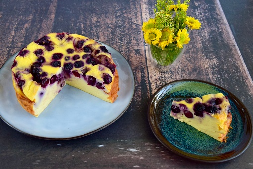 Homemade blueberry yogurt cake , decorated with yellow flower