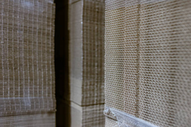 istock Folding cardboard boxes. Perforated sheets of corrugated cardboard a stack on pallets. Packaging of finished products in industrial production. 1578192618