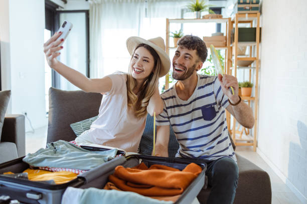 istock Joyful young couple making precious memories while packing for their travel 1578192665