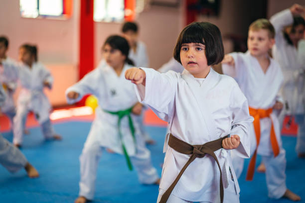 istock Karate Training, Kids of different ages in kimono 1578243947