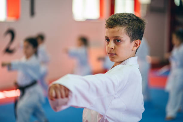 istock Karate Training, Kids of different ages in kimono 1578247916