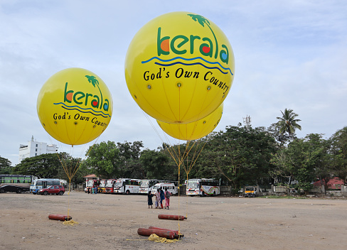 Kochi, Kerala, India-October 7 2022; Large Yellow colored Helium balloons promoting tourism in Kerala as 'God's Own Country' in Kochi city during the annual snake boat league race in India.