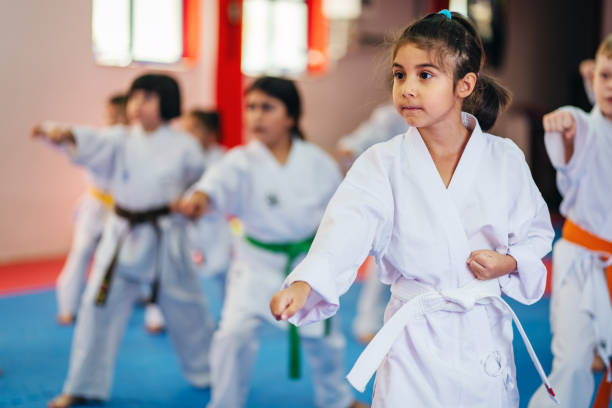 istock Karate Training, Kids of different ages in kimono 1578252279