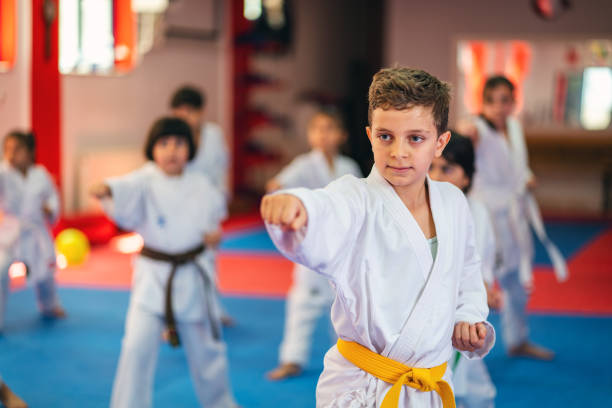 istock Karate Training, Kids of different ages in kimono 1578254523
