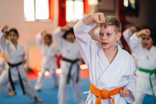 istock Karate Training, Kids of different ages in kimono 1578256187