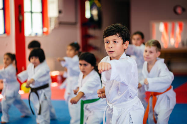 istock Karate Training, Kids of different ages in kimono 1578256188