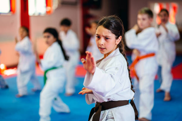 istock Karate Training, Kids of different ages in kimono 1578259932