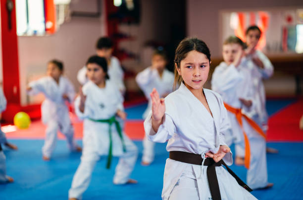 istock Karate Training, Kids of different ages in kimono 1578260445