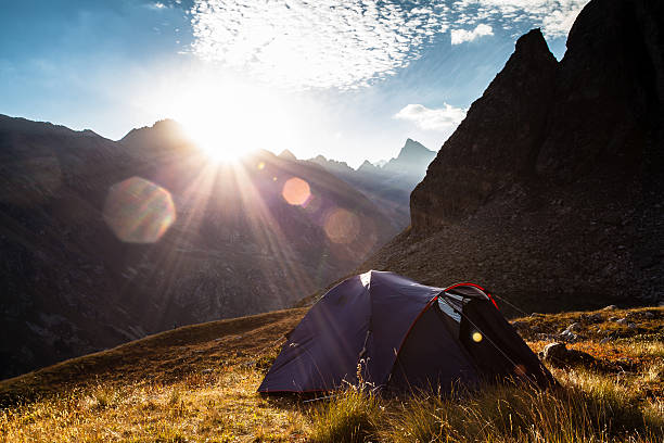 Sunrise in the mountains and tent