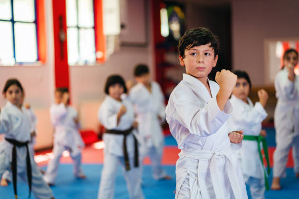 istock Karate Training, Kids of different ages in kimono 1578266453