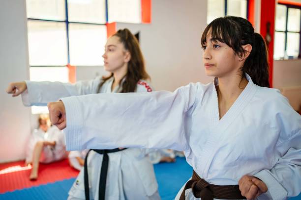 istock Teenage girl training during a karate class 1578269642