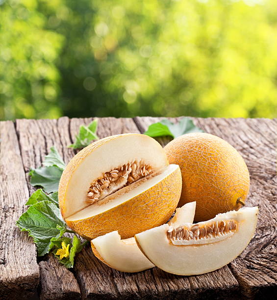 istock Melon with slices and leaves. 157827404