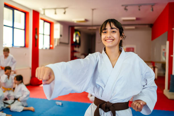 istock Teenage girl training during a karate class 1578275894