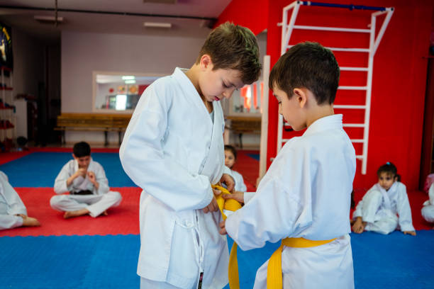 istock A group of elementary age children are taking a martial arts class. 1578288190
