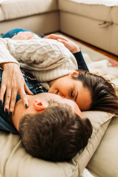 istock Couple sharing love on their first Christmas together 1578334131