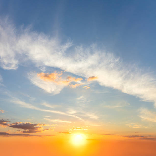 Natural  background Sunrise Sundown Sky with colorful clouds and sun. Cloudscape stock photo