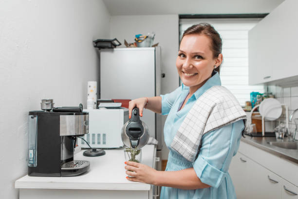 istock Woman and domestic water usage in the kitchen 1578373747