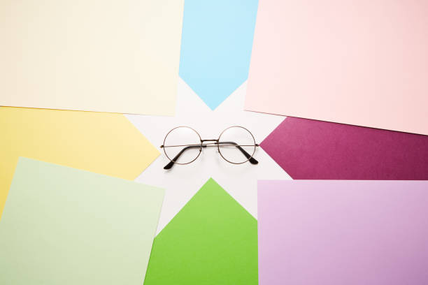 istock Eyeglasses with metal round rim is on abstract background. 1578374295