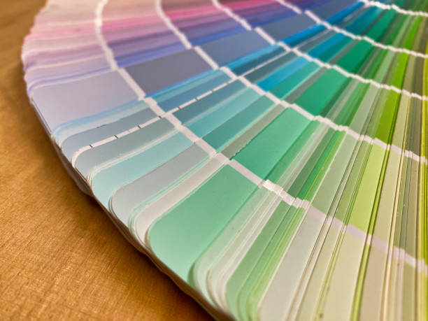 istock Fanned colour swatch booklet on a wooden tabletop 1578403392