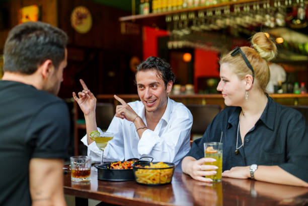 istock Friends reunion at the pub, summer vacation 1578410322