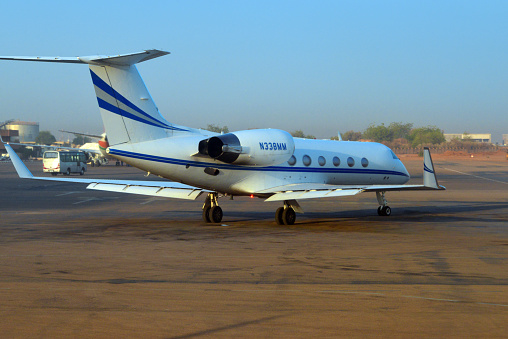Niamey, Niger: Gulfstream Aerospace G-IV Gulfstream IV used for imagery intelligence (IMINT), spy plane operated by Tenax Aerospace (registration N338MM, MSN 1076) - Tenax supports the U.S. Government, Defense and Civilian customers with special mission aviation solutions (Airborne Data Acquisition, Intelligence, Surveillance, Reconnaissance, National Security, R & D ,Testing ...) - Military Reconnaissance Aeroplane at Diori Hamani International Airport.
