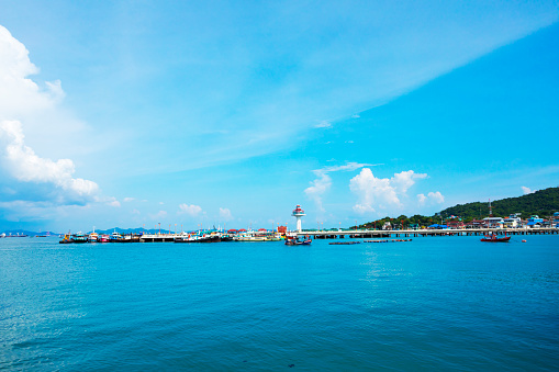 Harbor with lighthouse of Ko Sichang, small island in Chonburi province of Thailand