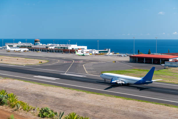 istock Airplane taking off in Madeira airport 1578545386