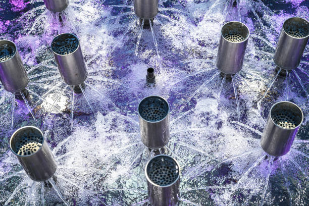Many small fountains with multi-colored illumination. Close up