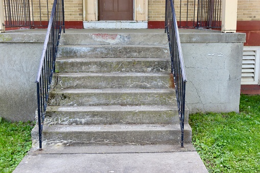 A close view of the steps on the porch.