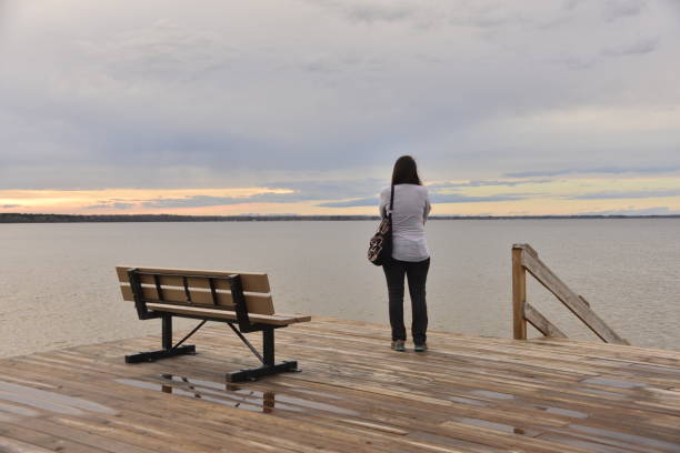 istock Tranquility By The Water And The Stormy Sunset 1578554166