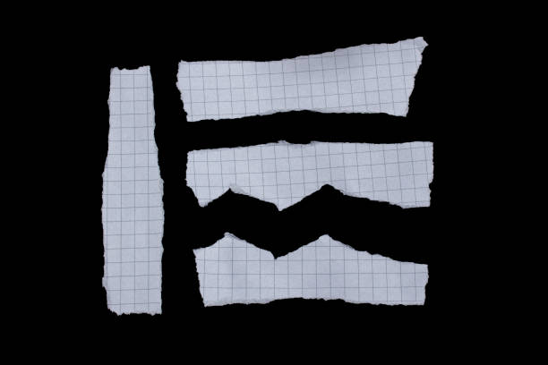 istock Rip paper isolated on a black background 1578560382
