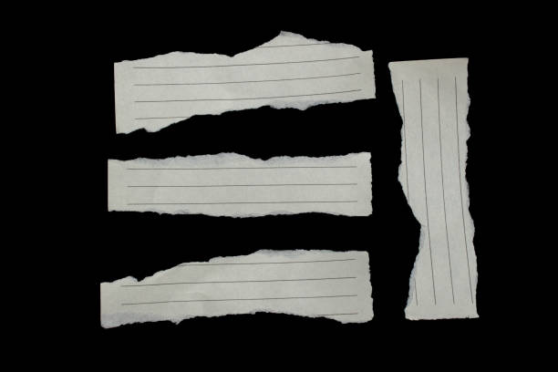 istock Rip paper isolated on a black background 1578560391