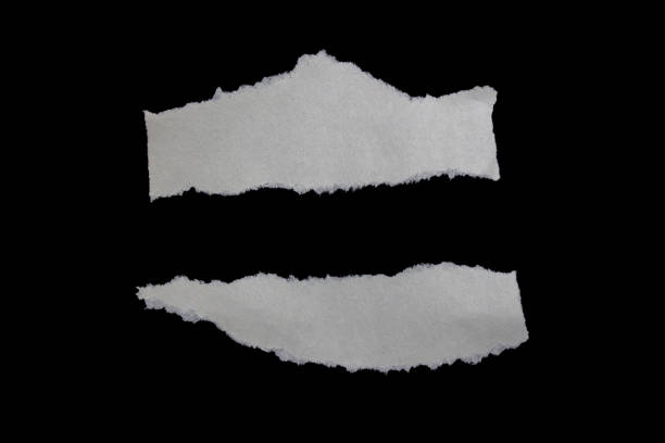 istock Rip paper isolated on a black background 1578560496